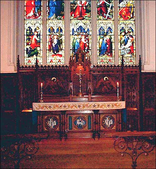 Photograph of the altar showing highlighted detail together with the East window