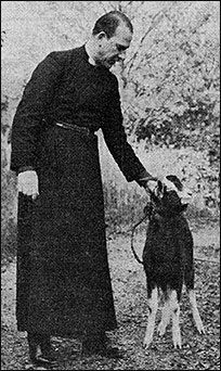 Photograph of Rev Derek Hole with Fred the goat