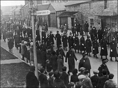 Ladies of the St John Ambulance Nursing Division marching past Osborne House at The Cross c1932
