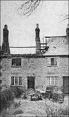 The damaged cottages after the Bakehouse Lane fire.