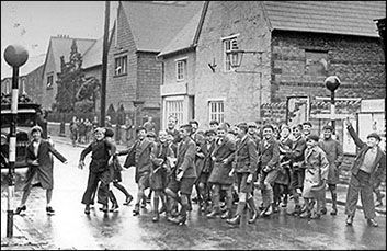 Photograph showing pupils crossing the road outside the Council School in 1939