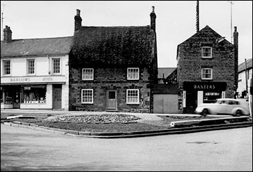Thatched cottage at The Cross 1960s, when the war memorial had been removed