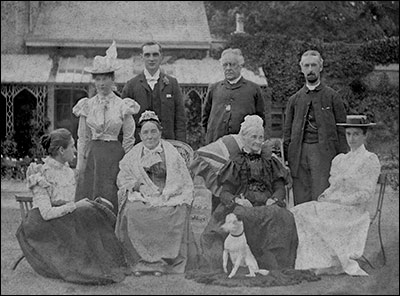 The Reverend Newman and his family in the grounds of the rectory sometime in the 1890s.