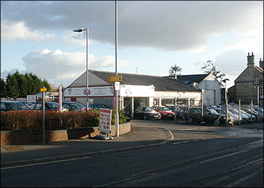 The car sales business which still survives ofn the site of the former businesses of Mason's Garage and Regency Cars
