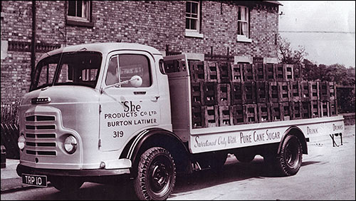 Photograph taken in 1964 of lorry in Meeting Lane with a full load of She Drinks.