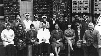 Photograph of the She Products Family and Staff taken in 1981.