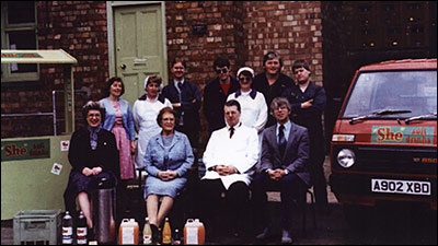 Photograph of the She Products Family and Staff taken in 1986.