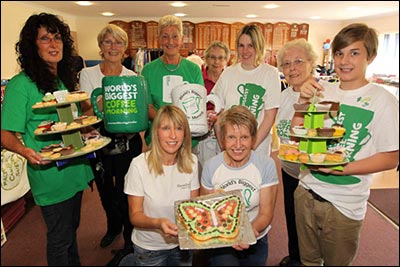 Iris Sharman pictured volunteering at a charity coffee morning in 2012