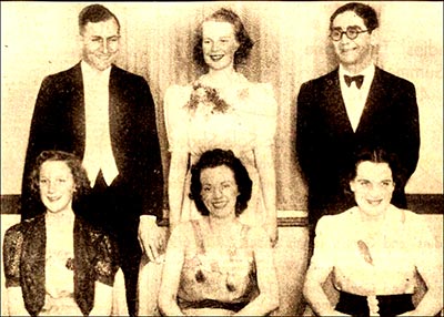 Selection of gala Queens with Judges.  Standing Dr G S Sturtridge, rugby football player and Dr Kessel both of Northampton General Hospital with Miss Sylvia Conroy (Clothing Trade).  Seated L to R: Miss Sylvia Johnson (Shoe & Leather Trade), Miss Irene Tear of Towcester (judge) and Miss Rose Johnson (Other Trades), The Misses Johnson are sisters.