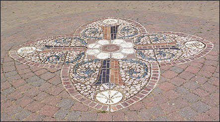 Photograph of mosaic within Millennium Gardens close to site of former Denton's Farm at bottom of Churchill Way