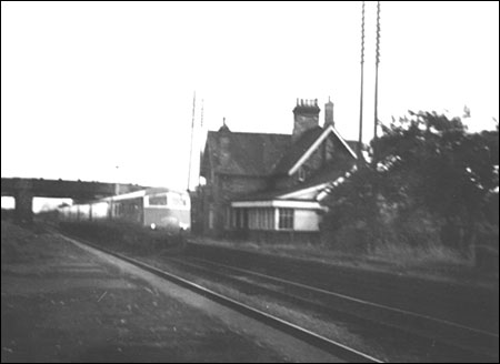 Photograph showing the Midland Pullman passing through the station in 1960