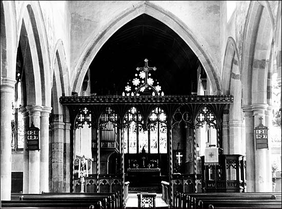Photograph showing interior of church before 1969 restoration showing the rood screen