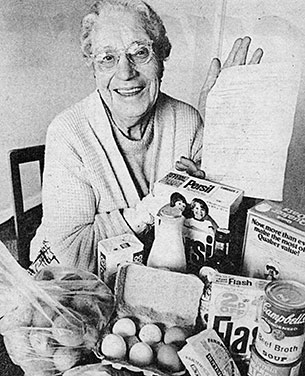 Eighty-nine-year-old Emma Keightley with some of the groceries she purchased with her Charity Voucher