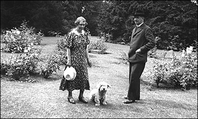 Revd. H.T.Edwards and Mrs. Edwards  in the Rectory gardens.