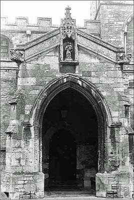 Burton Latimer church porch where bread was left for the poor or needy