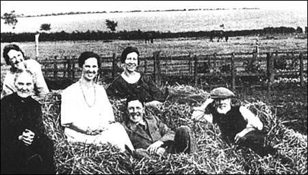 Mr & Mrs Talbutt with some of their family relaxing in their fields on The Wold c1925
