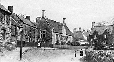 Photograph of Jacobean School and School House with Rectory in the background taken in 1905