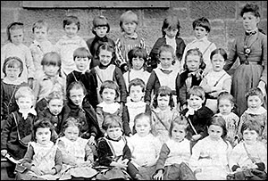 Photograph of Church School Infants with their teacher, early 1900