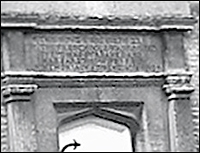 Inscription panel above door of Jacobean Church School dated 1622