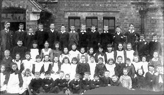 Burton Latimer Council School - large group and teacher, early 1900s