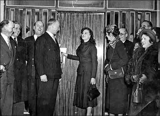 Photograph showing Lizbeth Webb opening new offices of Coles Boot Co in Newman Street