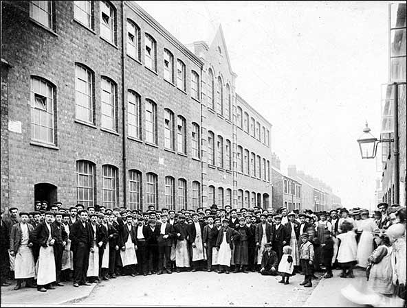 Workers pictured outside the factory