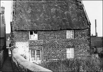 Rear view of the house showing the alleyway to the High Street