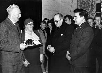 Presentation at the Preston Hall - Wif and henrietta Downing, Rev. R Sharpley and Captain Cook (Church Army)