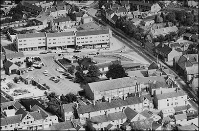 An aerial view of the central area in 1971.  The cinema is clearly visible, but the new Churchill Way development has replaced the old farm, and the gardens of The Poplars are now a car park.