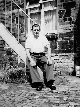 My dad Wilfred at bottom of our stairs 1956