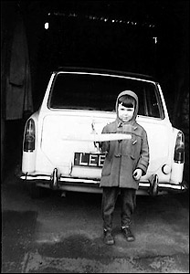 With toy aeroplane, Colin Plowman's Austin A30 in background