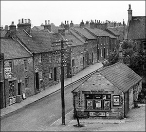 The High Causeway in about 1947.  the building in the foreground is part of Mason's Garage