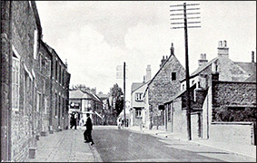 The High Causeway, showing the vaying width of the path and the double step up from the road