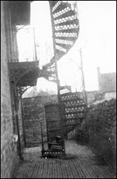 Spiral staircase and side entrance path