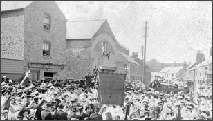A rally in the early 1900s near the Gas Company offices centre of picture)