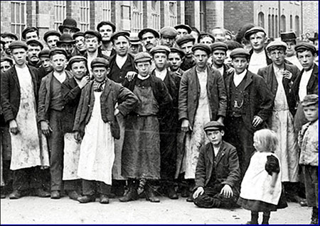 Boys working at Whitney & Westley's shoe factory in