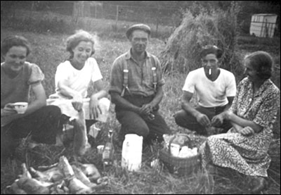 Smaller group photograph of the Denton family and their workers.