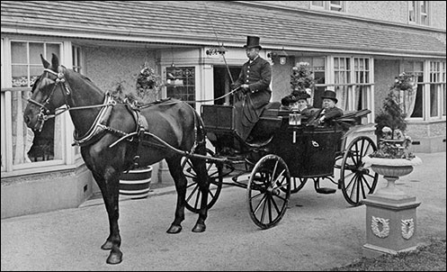 Mr & Mrs F W Preston in their carriage outside The Poplars in 1912