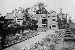 Photograph showing rear garden flowers at The Hall