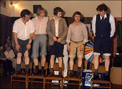 Photograph of male competitors for the knobbly knees competition at The Band Club c 1980.