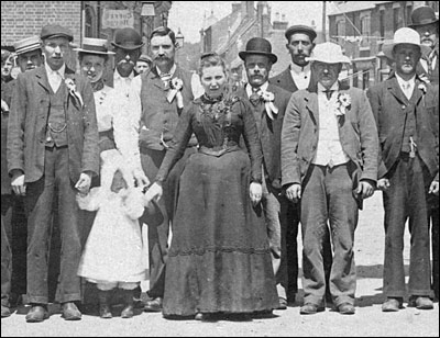 Enlarged part of the photograph on the left showing Elizabeth Newman in the middle of the crowd.