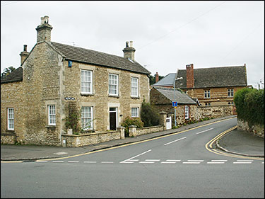 Modern photograph of The Thatcher's Arms, now a private residence, as viewed from the war memorial.