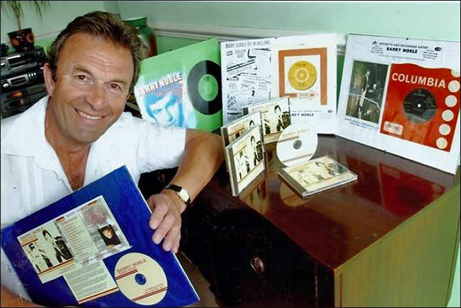 Barry Noble with memorabilia