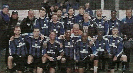 Burton Park Wanderers squad joined by 'Bo' Patrick' son and club chairman Mark (far left) following their 2-0 win over Sileby Rangers.