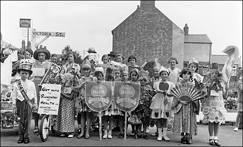 Some of the children who participated in the Co-operative Society parade c.1938.  This photo was taken at the junction of Victoria Street and Station Road