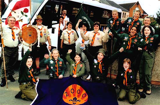 The Mohawk Troop pictured just before leaving for Germany, Group Scout Leader, Bob Peden wearing traditional scout hat.  Assistant Scout Leader, Adrian Watts, is extreme right at the back.