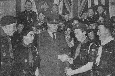 Queen's Scouts Jim Arnold and Don Middleton receiving their awards