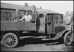 Keightley's haulage truck in yard in 1938