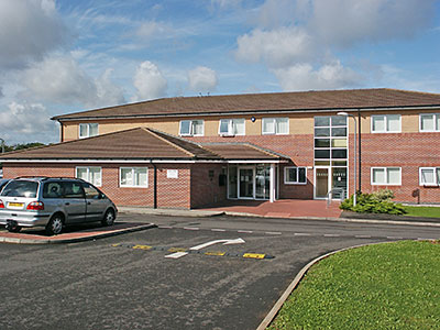 Photograph of the Medical Centre viewed from the car park