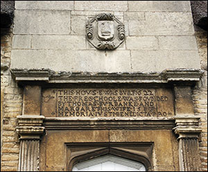 Photograph of inscription above central doorway of former Jacobean School